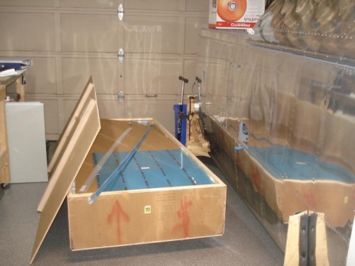 Tight spaces....crate cracked next to the wings.