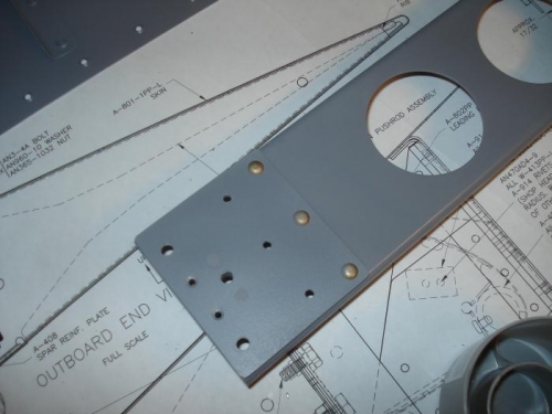 Nutplate countersunk and riveted with reinforcement