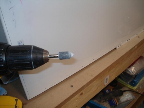 Use a tapered stone to countersink fierglass.