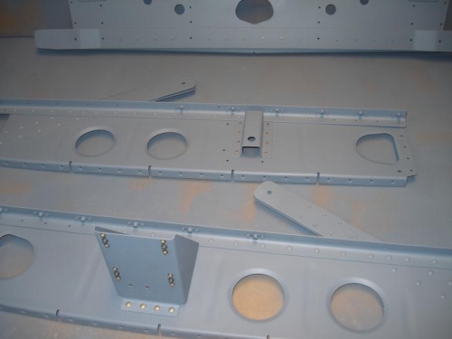 Brackets for electirc aileron trim installed