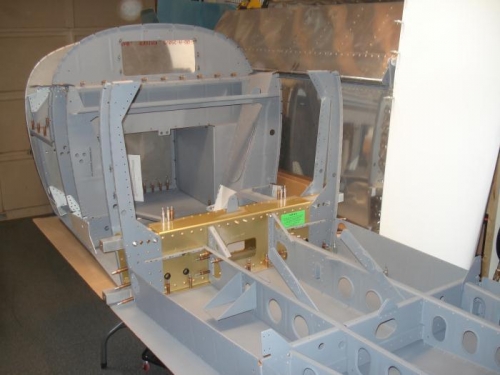 Centre seat rib assembly skins riveted in place.