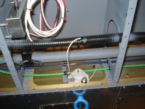 Routing for stall warner into conduit.