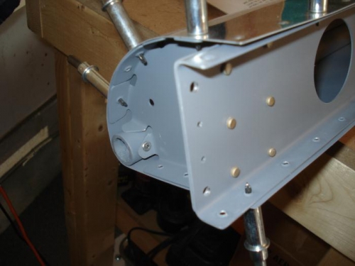 Left nose rib riveted in place