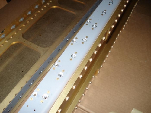 Both spar flangers have been countersunk and the K1100-8 and K1000-06 nutplates riveted