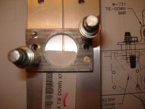 Both tie-downs are countersunk for the flush rivet