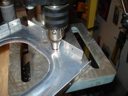 Opened the tooling holes to 7/16