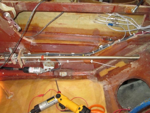 Conduit anchored and floxed in place