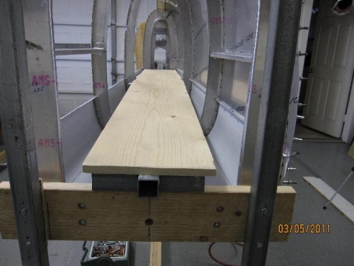 Crawling board suspended above bulkheads