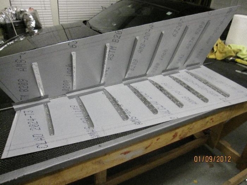Stiffeners riveted to new skin