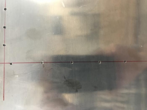 Showing alignment of template holes to rib