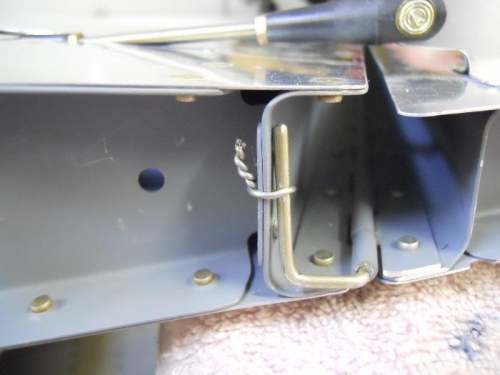 Safety wired trim hinge pin