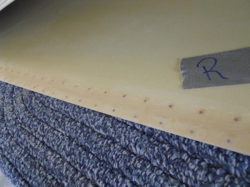 R. tip-glassed over previous holes