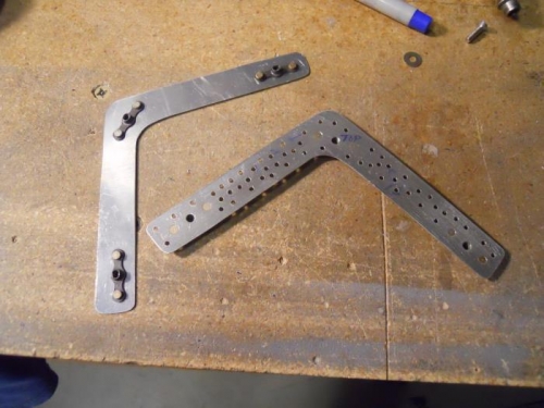 Backing strips-one drilled for bonding holes