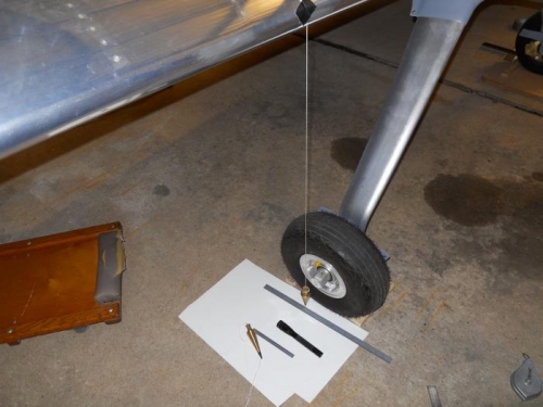 Measuring distance between wing and axle