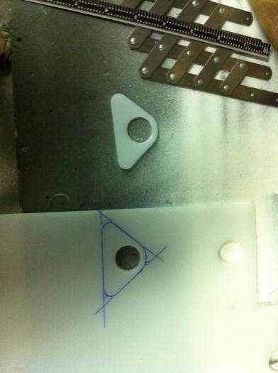 Second hole drilled with unibit, and layed out for cutting on the bandsaw
