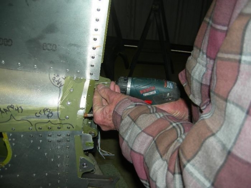 Installation of mounting bracket and bolts for rudder assembly