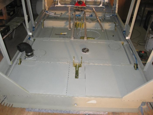 Stowage hatches behind the rear seats assembled