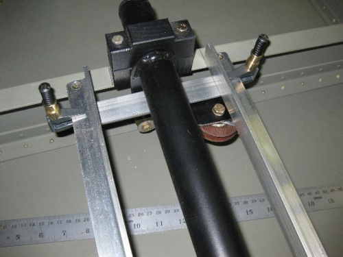 Bracket and pulley for flap control cable