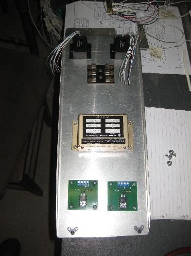 Mounting tray that goes behind the panel and connects to the firewall.