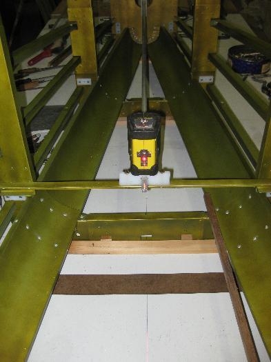Using the Laser level to check alignment of pushrod holes on centreline.