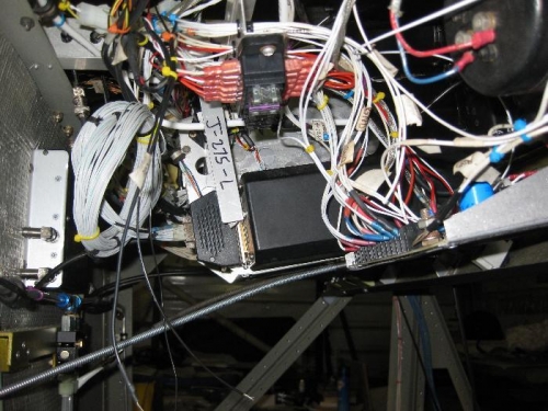 Looking under the dashboard behind the load centre