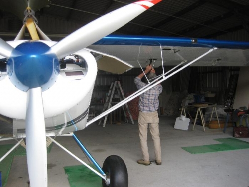 Ron doing the second check of the aileron bellcranks & rod ends.