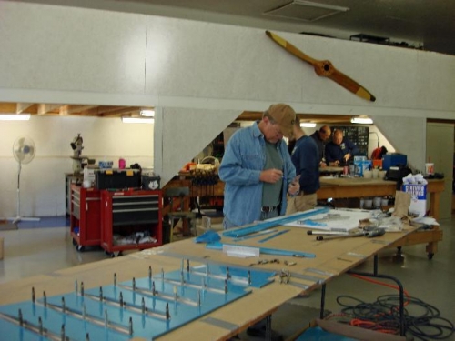 Stiffeners attached toTable through Skin