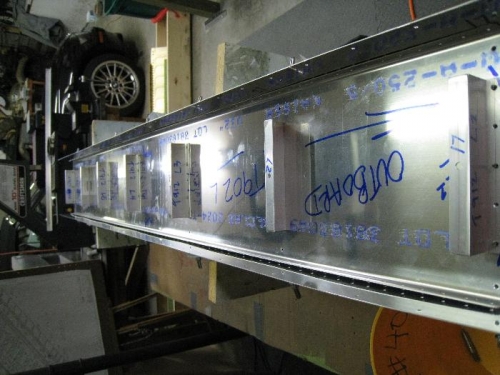 Tank Attach Brackets Riveted to Baffle