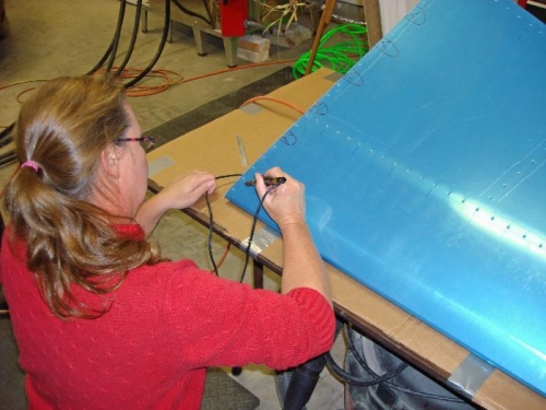 Beth Soldering Off Blue Strips