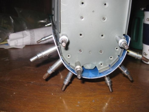 Same thing at the back, skin is too thick to just pull it in and rivet.