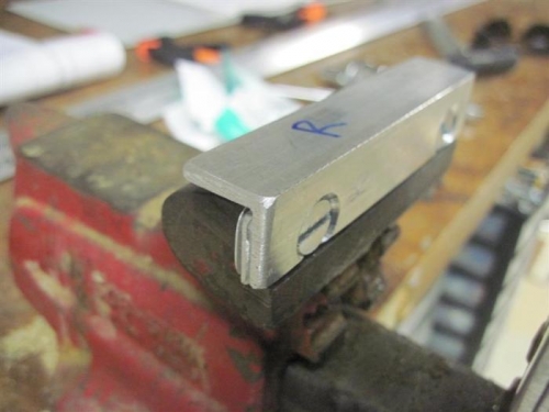 Vise jaw pad made from non-a/c aluminum angle, with shims behind.