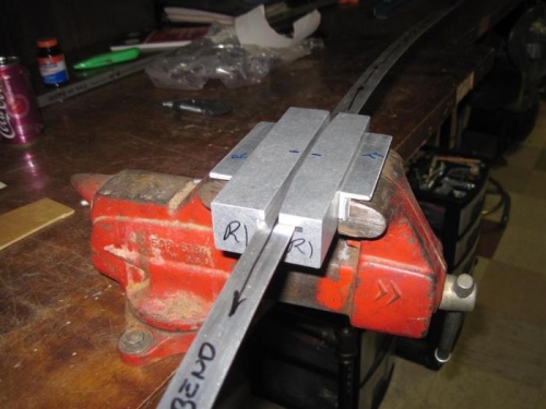 Forming the first long curve in the right longeron.