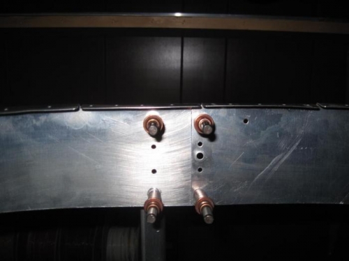 I first tried to cleco the vertical bellcrank channel to the center holes, didn't want to fit.