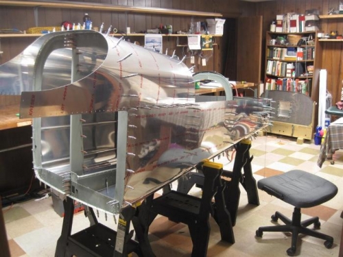 Top front skin clecoed in place to help make the tub more rigid during the drilling process.