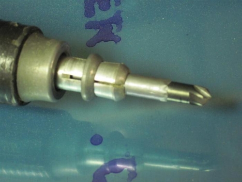 Closeup of the friction chuck and deburring tool (countersink).