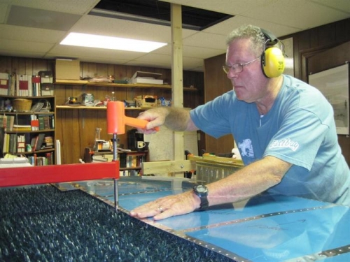 Making a lot of noise and dimples with the C-Frame dimpler and hammer.