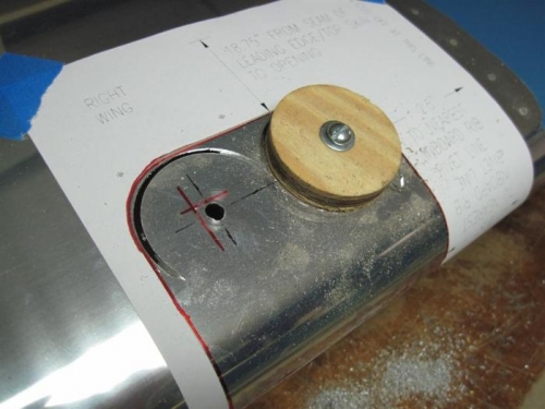The setup for cutting out the rounded corners with the hole saw.