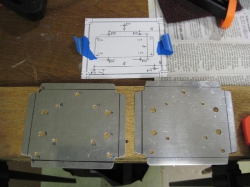 The plates that will hold the lights and in turn be mounted to the fixed brackets.