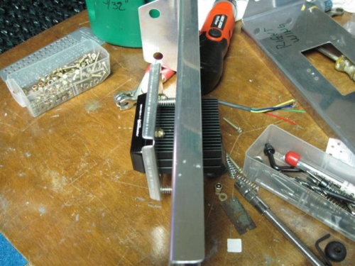 The landing light bolted in the adjustable mount, in turn mounted to the support bracket.