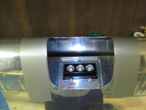 Landing light mounted in place in the left wingtip leading edge.