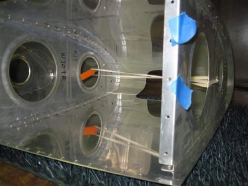 A pretty handy third hand when drilling for the nutplates for the light mounting bracket.