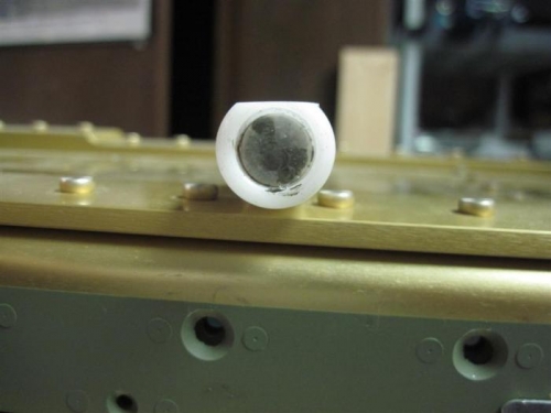 The back riveting set with the edge filed to fit over the leading edge rivets