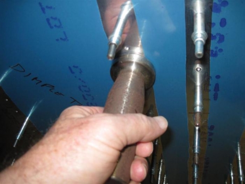 The plastic film under each side of the bucking bar.