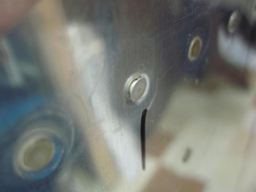 One of the trailing edge rivets that did not seat well.