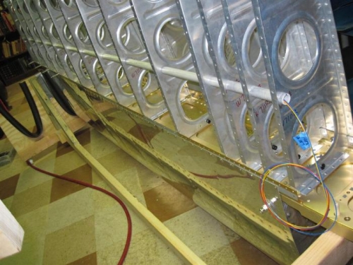 The left wing wiring conduit and the landing light light wires