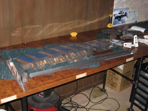 The left elevator drilled, disassembled and ready for the deburr, dimple & prime routine.