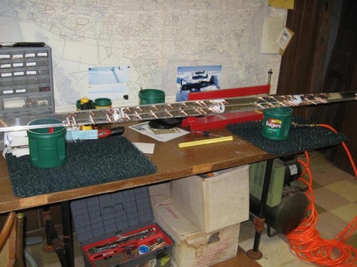 Rear HS spar all clecoed together and supporting itself across two coffee cans. You can see that the C