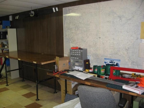 New bench in place; when the stuff is moved from the old one, it will be raised to match the new one.