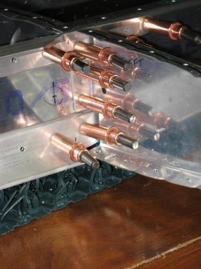 The 4 holes in the left HS that connect the inboard ribs, reinforcing angles, and the forward spar.