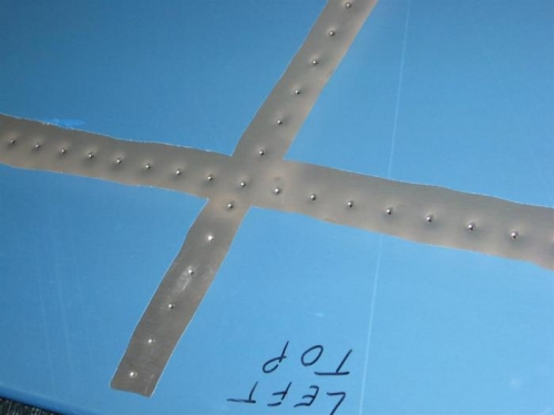 Some dimpled holes of the 460 in the HS skin that will be dimpled